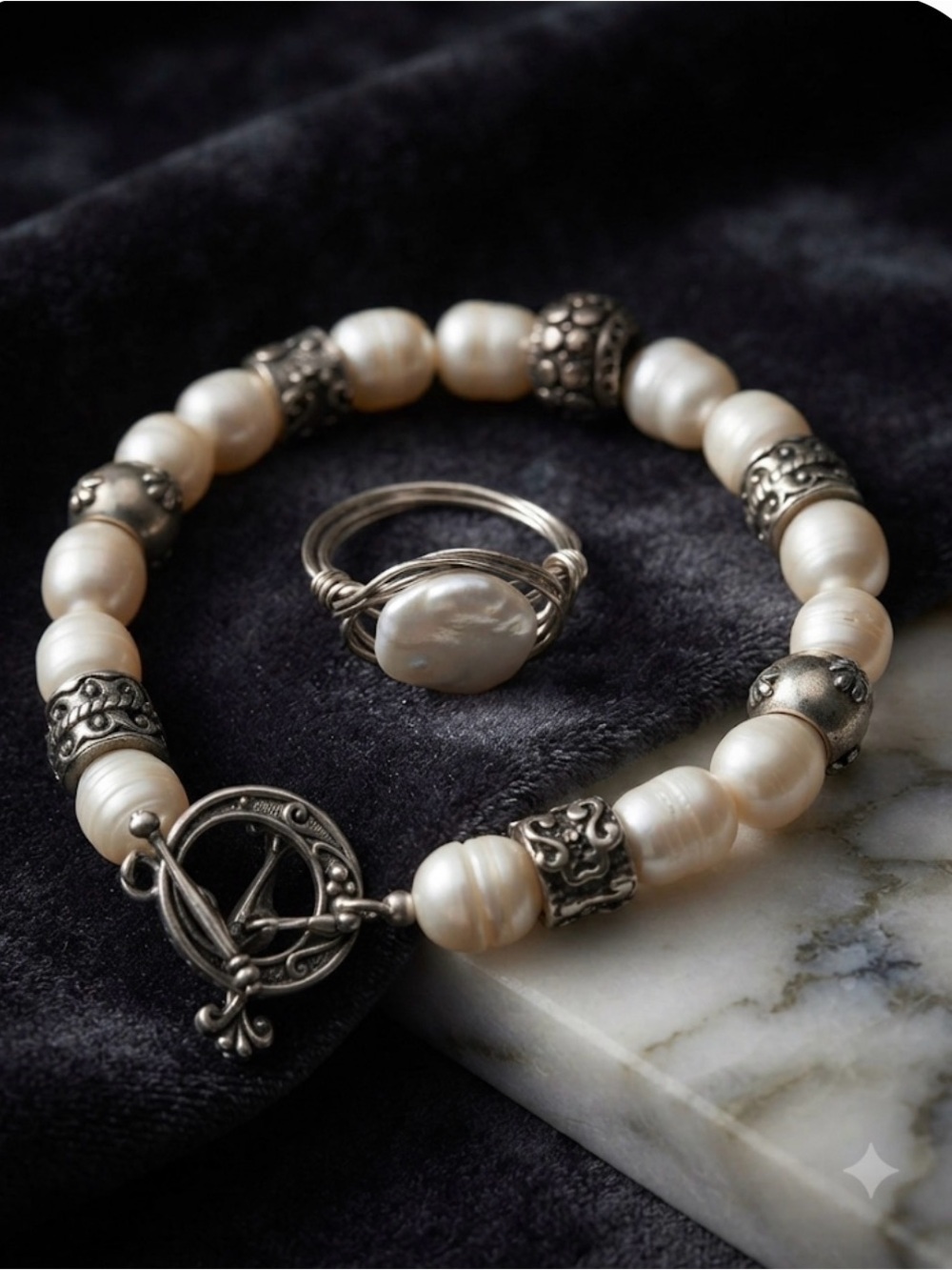 Pearl Ring (925 wrapped) and sterling silver and freshwater pearl bracelet.